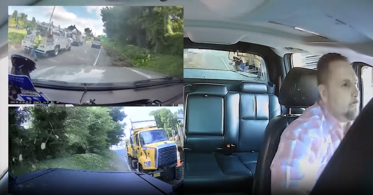 Dashcam Screengrab Of Mecham Driving Over AN Embankment And Almost Hitting Workers